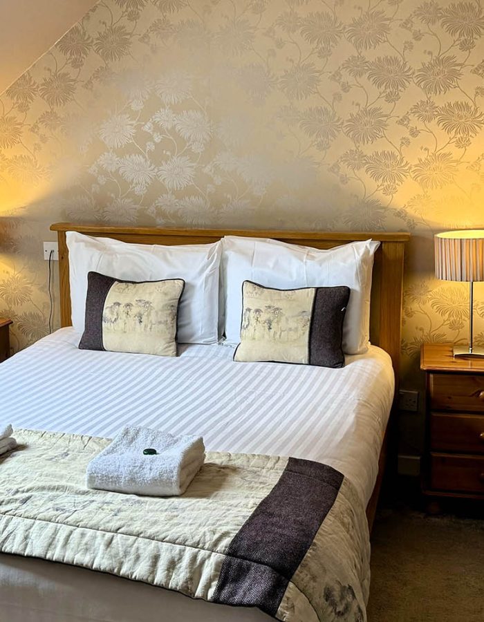 A cosy double bedroom at Glen Clova Hotel