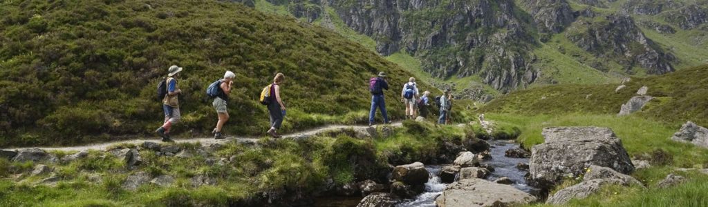 Line of walkers in Scotland