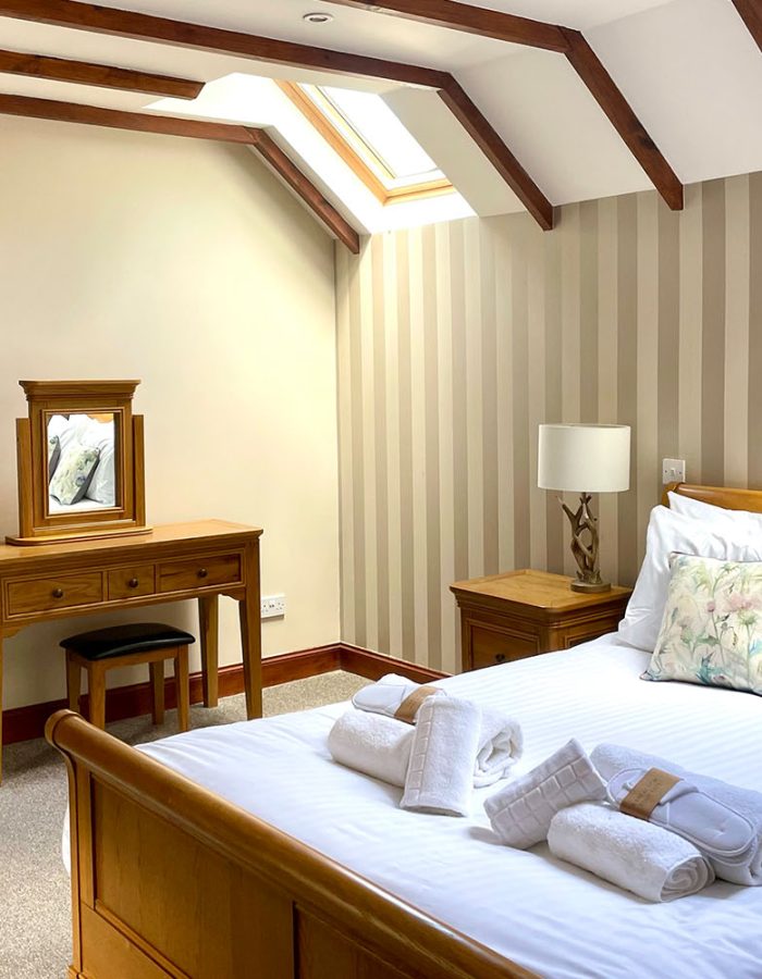 The double bedroom in Old Mill Lodge at Glen Clova Hotel and Lodges in Scotland