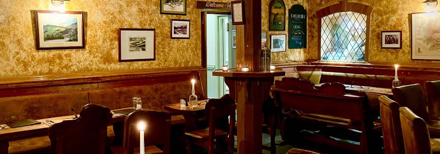 Tables and seating in The Climber's Bar at Glen Clova Hotel and Lodges in Scotland