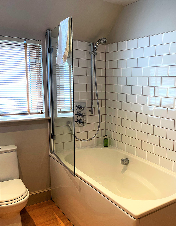 A bathroom in Brandy Cottage at Glen Clova Hotel