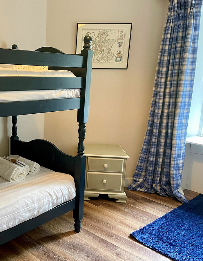 Bunk beds in a bedroom in The Old Manse at Glen Clova Hotel