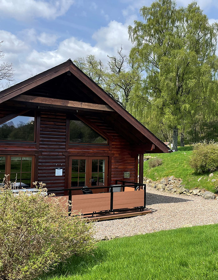 The exterior of a Clova Lodge at Glen Clova Hotel