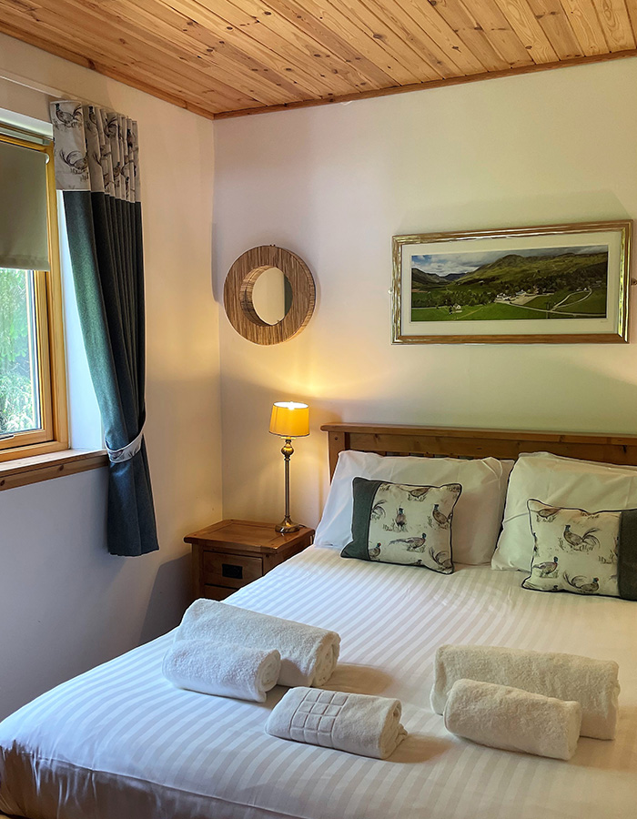 A double room in a Glen Lodge at Glen Clova Hotel