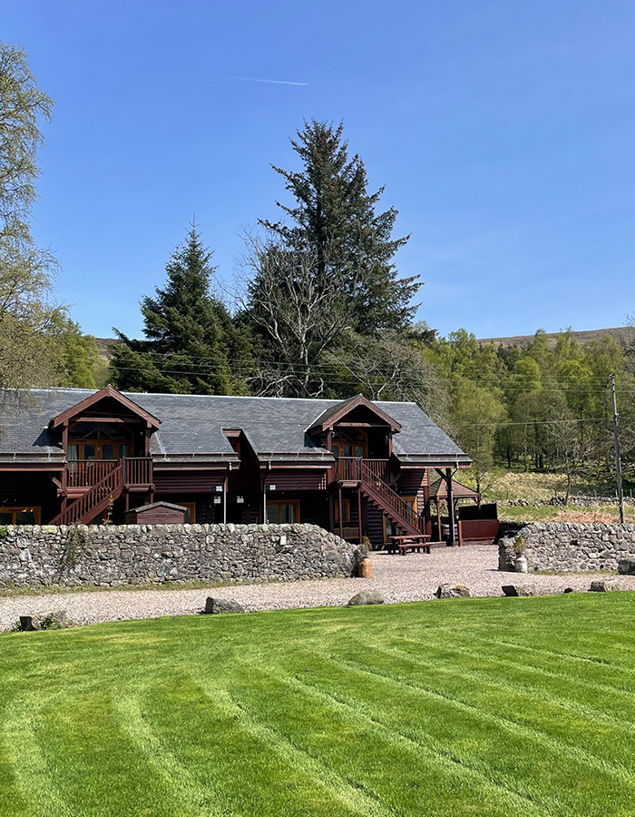 The exterior of a Glen Lodge at Glen Clova Hotel