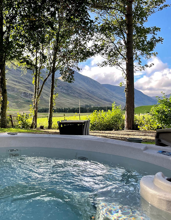 The hot tub with stunning views at Brandy Cottage at Glen Clova Hotel