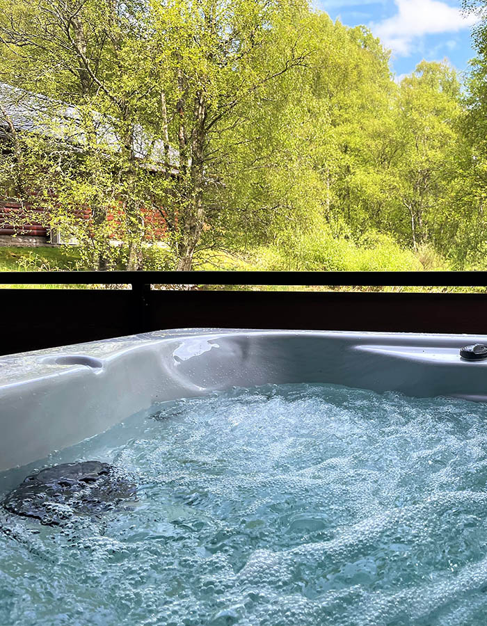 A hot tub at a Hideaway Lodge at Glen Clova Hotel