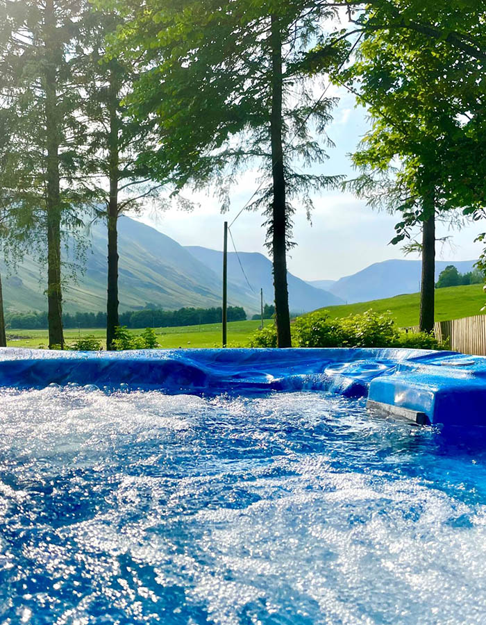 A hot tub with spectacular views in The Old Manse at Glen Clova Hotel