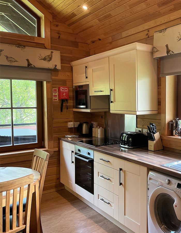 A kitchen in a Hideaway Lodge at Glen Clova Hotel