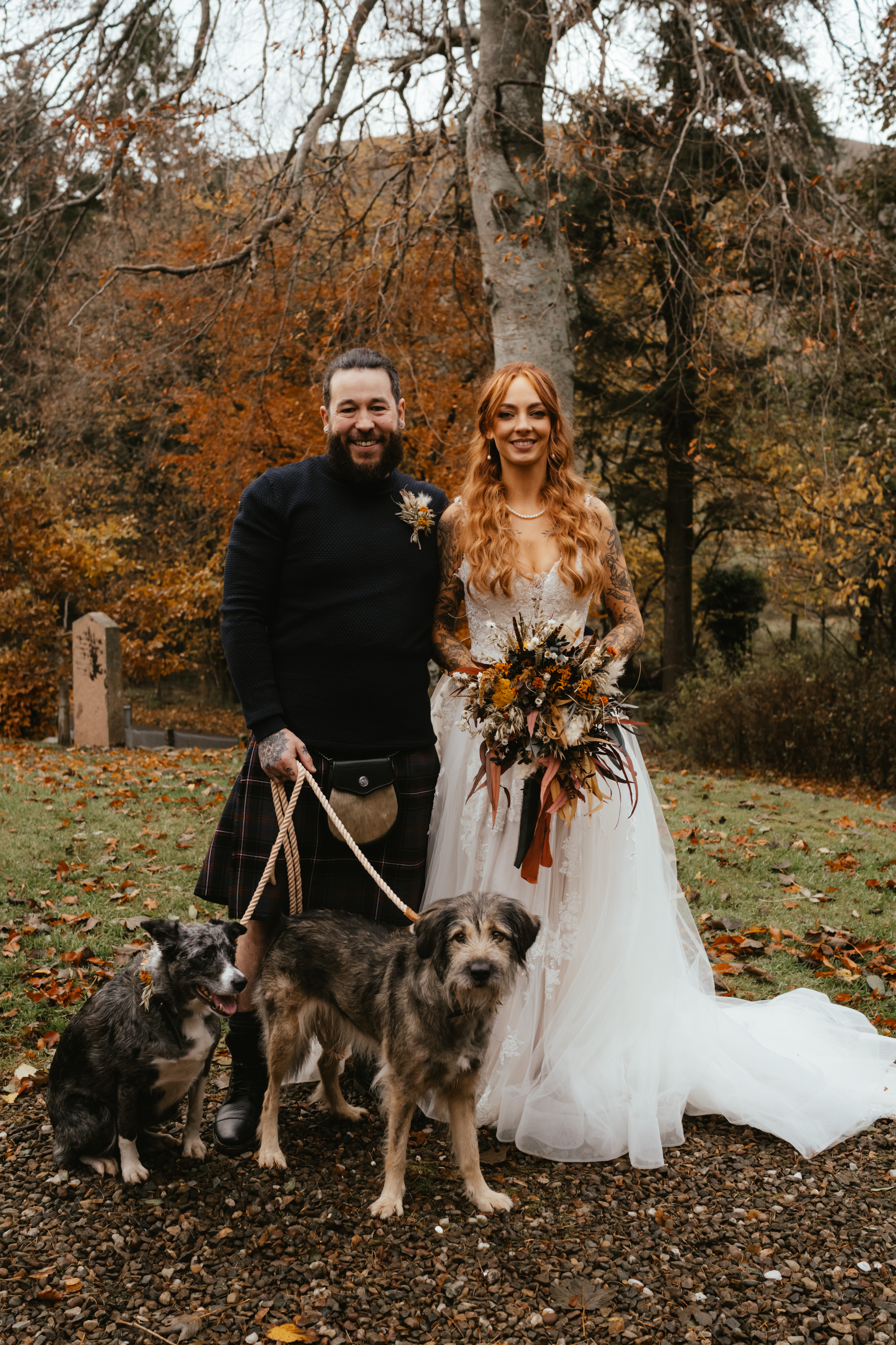 Bride and Groom with their dogs on an autumn day in Glen Clova Photography by  Mad House Weddings https://madhouseweddings.com