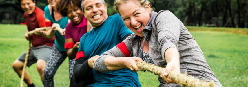 Group taking part in a tug-o-War team-building activity