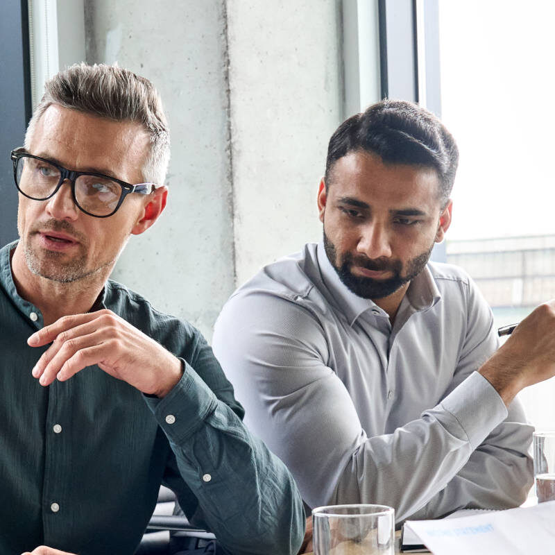 Group of 5 people at a business meeting