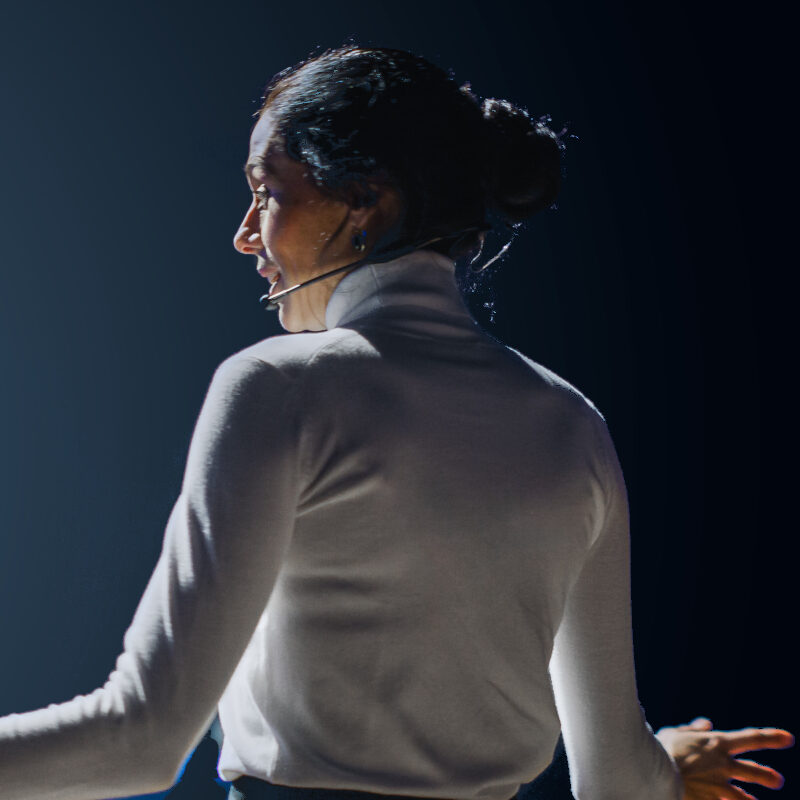 Woman speaking at a business conference